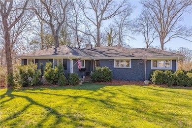 Single story home with a front yard, crawl space, 