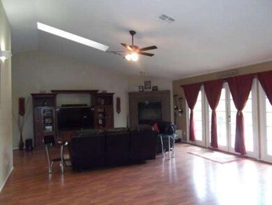 Open Family Room with a Beautiful Large Fireplace,