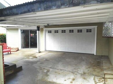 Carport/2 car garage and bonus room.
