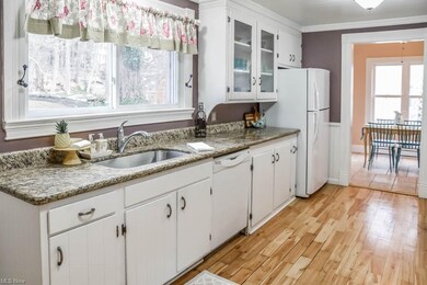 Beautiful granite in this updated kitchen with pai