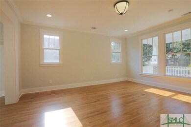 large front windows facing the front porch.