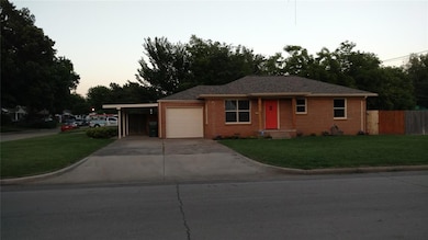 Ranch-style house featuring brick siding, concrete driveway, and a garage