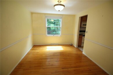 Separate dining room accented with a chair rail.
