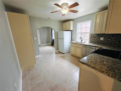 Kitchen looking into living room.