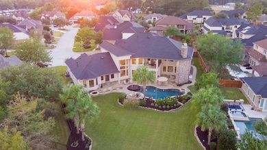 The backyard design balances bold architectural features and lush landscape, delivering an effortless indoor/outdoor lifestyle.