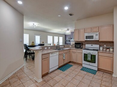 Kitchen area open to the family room