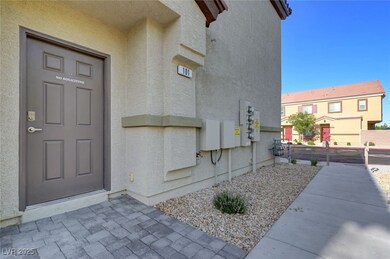 Entrance to property with stucco siding