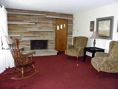 Living Room. Access to wrap around porch.