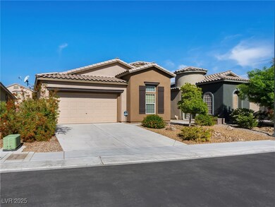 Mediterranean / spanish-style house featuring a ti