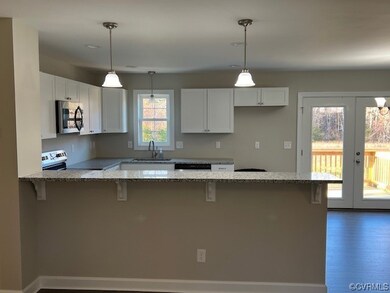 Breakfast bar area, granite stone counters,  white