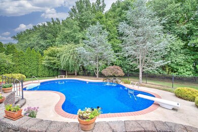 47 W Canadian Woods Rd, Manalapan, NJ 07726 - photo 2