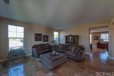 Living Room with Beautiful Honed Travertine Floors