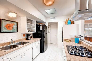 10802 W Cherry Hills Dr W   Sun-small-01