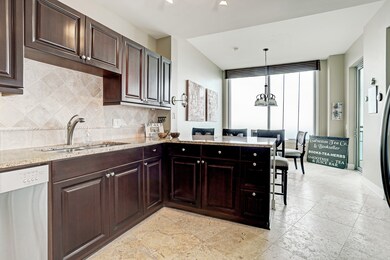 Kitchen includes stainless steel appliances, a bre