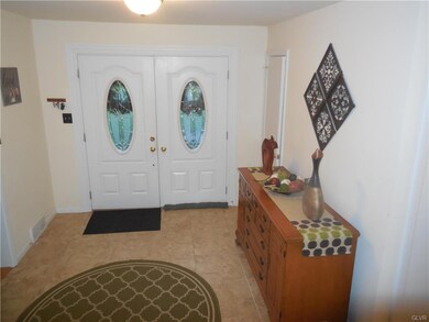 Inviting large tiled entranceway