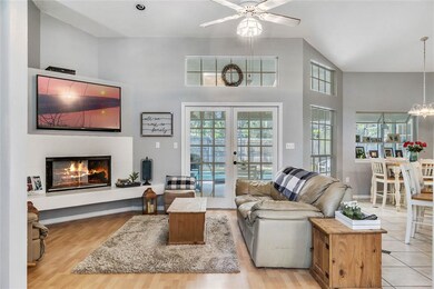 Family room with laminate floors and french doors 
