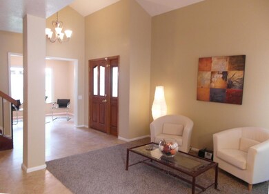 Living Room View To Entry & Dining
