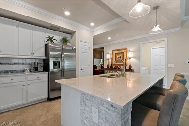 The large one level kitchen island has been custom
