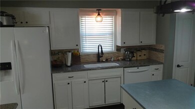 507 N Jefferson St, Raymore, MO 64083 - photo 7