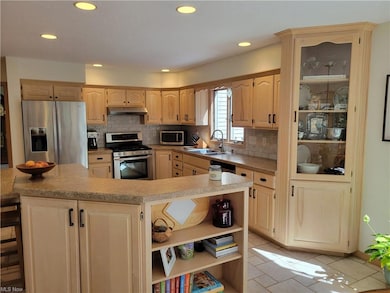 SPACIOUS-FRESHLY UPDATED COUNTER TOPS, BACKSPLASH, RECESSED LIGHTING