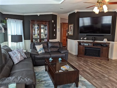 Living room complete with electric fireplace