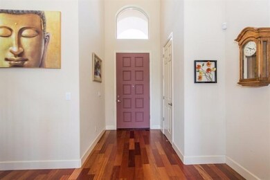 Entry with views of the living room.  The wall of 