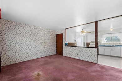 Living Room open to Sunny Kitchen!
