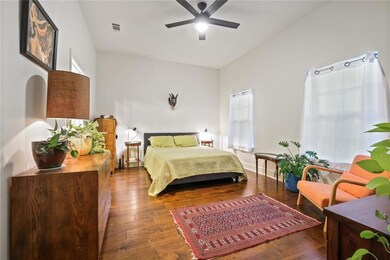 Generous primary bedroom with giant walk-in closet