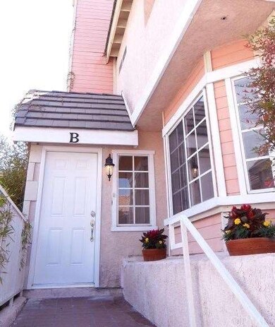 Front Entrance w/ Beautiful Lighting Fixture.