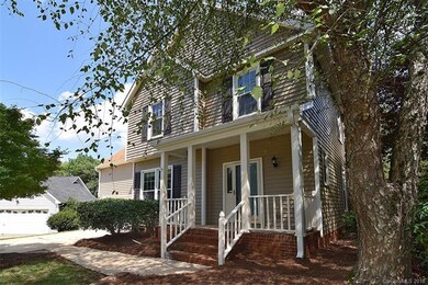 New vinyl siding; covered, sitting porch, and matu