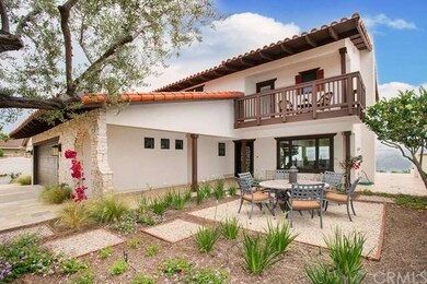 Large inner courtyard in front of home with drough