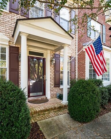 Covered porch at front entrance invites visitors i