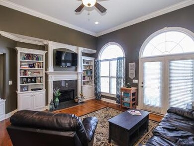 Living room with fireplace and built-ins.