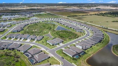 Welcome the the neighborhood!  Home is on the large area of pond with a conservation area in front of the home.