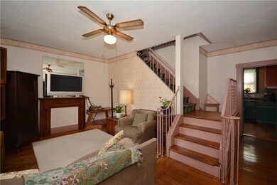 The parlor is just off the front entry. It is outf