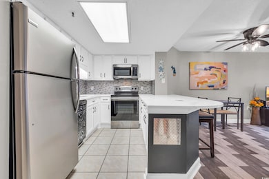 Kitchen featuring tasteful backsplash, a breakfast
