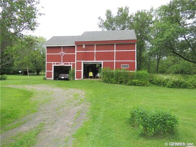 Barn. 2-Story Barn needs work * 2-overhead doors -