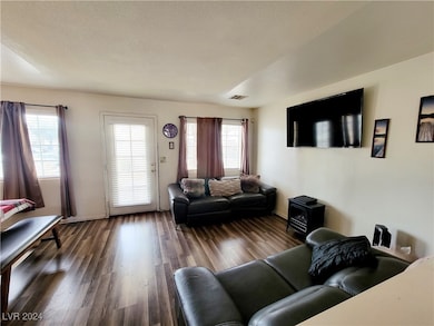 LOTS OF NATURAL LIGHT DOOR TO BACK PORCH TO COMMUN