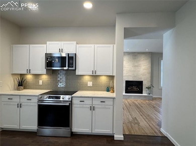 Modern appliance and perfectly placed lighting