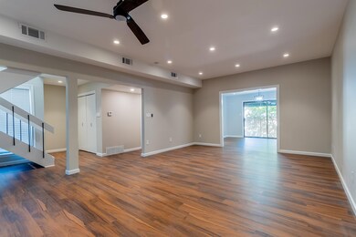 The Great room features a custom ceiling fan and o