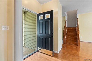 Foyer with light hardwood floors