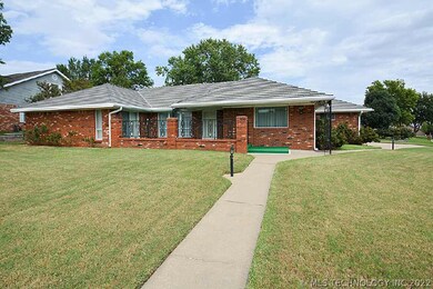 Full brick exterior, full guttering, partially cov