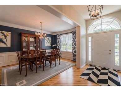Formal Dining Room with custom moldings and newer 