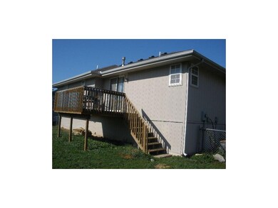 Backyard view of home and deck!