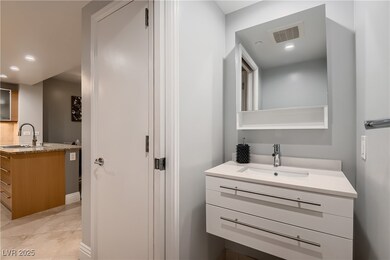 Sleek fully remodeled powder room.