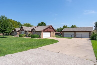 30 x 40 detached shop/garage with half bath.