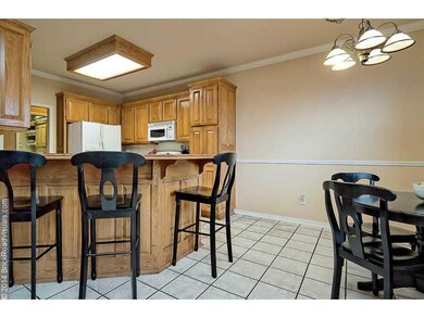 Kitchen. Spacious Kitchen has tons of cabinets & a