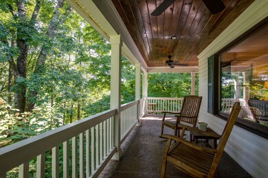 This welcoming, wrap-around porch is ready for endless coffee & conversation.