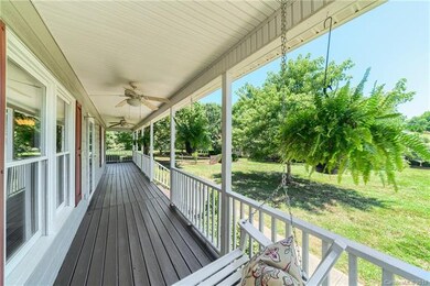 porch swing on wrap-around deck