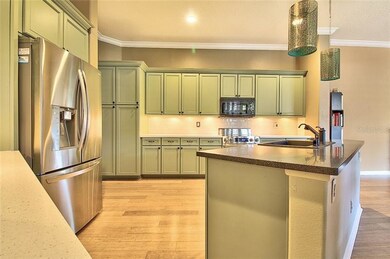 The kitchen also features a Dacor Range with an al